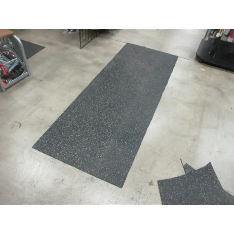 Used 6.5 Foot x 2.5 Foot x 8mm Rubber Flooring (HAS SMALL RIP)