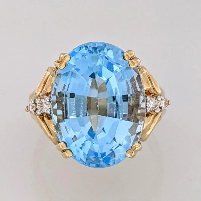 14K BLUE TOPAZ OVAL 12X16 WITH (4) MELEE ESTATE RING 8.8 GRAMS