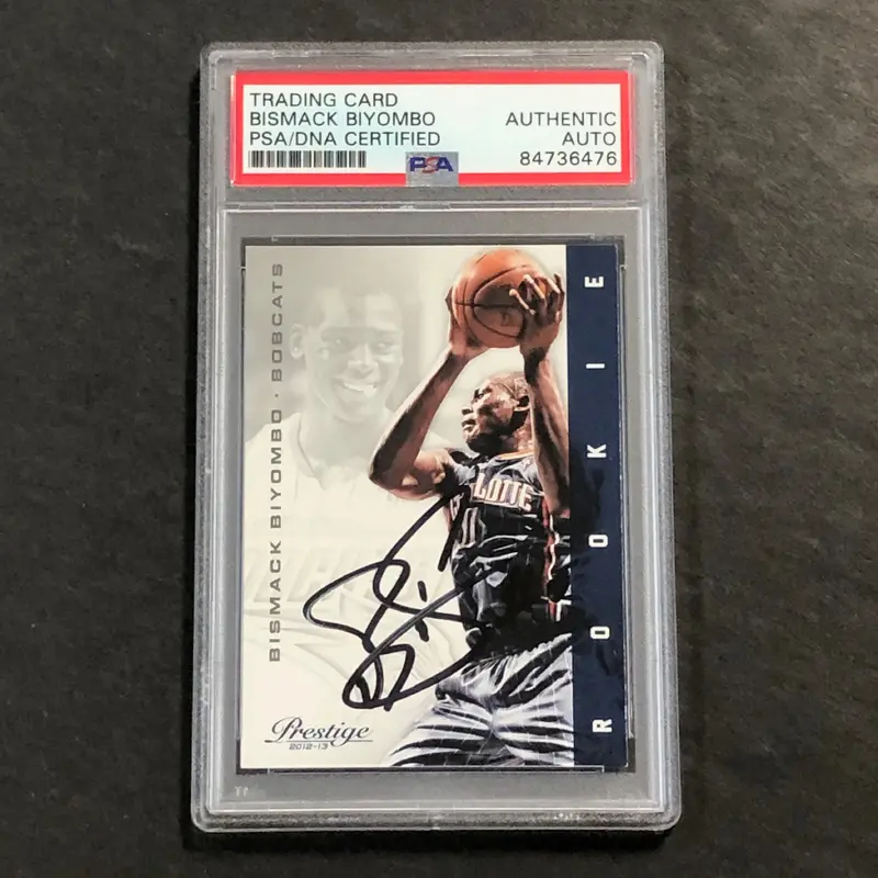2012-13 Panini Prestige #174 Bismack Biyombo Signed Card AUTO PSA Slabbed RC Bobcats